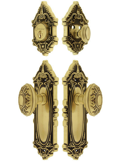 Grandeur Grande Victorian Entrance Door Set, Keyed Alike with Decorative Oval Knobs in Antique Brass.